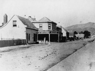 Cuba Street, Wellington, circa 1870s, showing Anderson & Janson's store and a branch of Kirkcaldie & Stains.