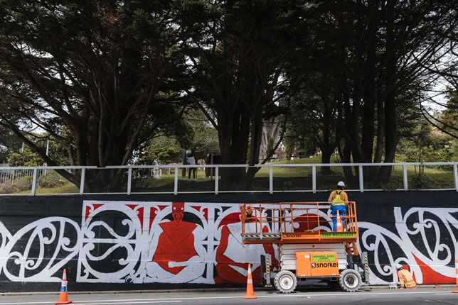 Ariki Brightwell painting on Bowen Street viewed from other side of road
