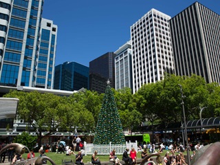 Picture of Midland Park showing people enjoying the park in a sunny day.